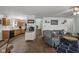 Open-concept living room and kitchen featuring hardwood floors and lots of natural light at 10613 Glenayr Dr, Camby, IN 46113