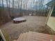 This backyard has a hot tub and is surrounded by trees at 1195 Hinson Rd, Martinsville, IN 46151