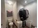 This bathroom features a toilet, towel rack, and clothes rack at 1195 Hinson Rd, Martinsville, IN 46151