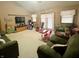 Spacious living room with vaulted ceiling, comfortable seating, and lots of natural light at 1195 Hinson Rd, Martinsville, IN 46151