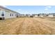 Spacious backyard with a well-maintained lawn, ideal for outdoor activities and entertaining at 1230 Maumee Ct, Greenfield, IN 46140