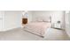 Comfortable bedroom features plush carpet, stylish headboard and bathroom access at 1230 Maumee Ct, Greenfield, IN 46140