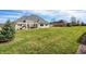 Expansive backyard with a patio featuring a pergola, providing a serene outdoor retreat at 1434 Manchester Dr, Danville, IN 46122