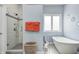 Bright bathroom with a soaking tub, glass shower, and neutral tones at 1434 Manchester Dr, Danville, IN 46122