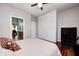 Comfortable bedroom featuring built in wardrobe and dark hardwood floors at 1434 Manchester Dr, Danville, IN 46122