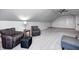 Spacious bonus room perfect for relaxing with comfortable seating arrangements at 1434 Manchester Dr, Danville, IN 46122