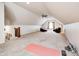 Expansive bonus room with vaulted ceilings and versatile carpeted flooring at 1434 Manchester Dr, Danville, IN 46122