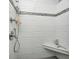 Modern walk-in shower boasts stylish tile and convenient seating at 1434 Manchester Dr, Danville, IN 46122