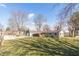 Spacious backyard featuring a metal garage, shed, and a covered patio perfect for outdoor entertaining and relaxation at 1780 S Mauxferry Rd, Franklin, IN 46131