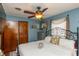 Inviting bedroom with a wrought iron bed, natural light, and decorative accents at 1780 S Mauxferry Rd, Franklin, IN 46131