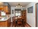 Cozy dining area features a wooden table, chairs, and natural light from the window at 1780 S Mauxferry Rd, Franklin, IN 46131