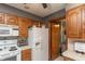 Bright kitchen with white appliances and wooden cabinets at 1780 S Mauxferry Rd, Franklin, IN 46131