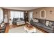 Spacious living room featuring hardwood floors, comfortable seating, and ample natural light at 1780 S Mauxferry Rd, Franklin, IN 46131