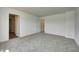 Spacious bedroom with neutral carpet and white walls offers a blank canvas for personalization at 1950 Black Oak Dr, Shelbyville, IN 46176