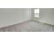 Clean bedroom with a window and closet, offering a blank canvas for personalization at 1950 Black Oak Dr, Shelbyville, IN 46176