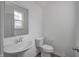 This is a half bathroom with white walls, hard surface floors and nice fixtures at 1951 Black Oak Dr, Shelbyville, IN 46176