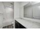 Bathroom with a shower/tub combo, large mirror, and vanity with granite counters at 1951 Black Oak Dr, Shelbyville, IN 46176