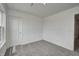 Bedroom with gray carpet, white walls, and a nice window at 1951 Black Oak Dr, Shelbyville, IN 46176