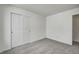 Bedroom showcasing a closet with double doors and neutral carpet at 1951 Black Oak Dr, Shelbyville, IN 46176