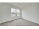 Bedroom with a big window, white walls and gray carpet at 1951 Black Oak Dr, Shelbyville, IN 46176