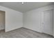 Bedroom showcasing neutral carpet and a door at 1951 Black Oak Dr, Shelbyville, IN 46176