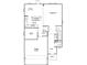 Open-concept floor plan featuring a spacious kitchen, dining area, great room, and patio at 1951 Black Oak Dr, Shelbyville, IN 46176