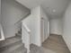 Hallway with stairs and closet at 1951 Black Oak Dr, Shelbyville, IN 46176