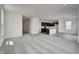 Open-concept living room and kitchen area with island at 1951 Black Oak Dr, Shelbyville, IN 46176