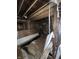 Unfinished basement showing exposed ceiling beams and under-floor utility access at 21 S Warman Ave, Indianapolis, IN 46222