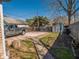 Large backyard with concrete pad, shed, mature trees, and plenty of space at 2333 Villa Ave, Indianapolis, IN 46203