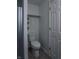 Compact bathroom featuring a toilet and a shower stall, ideal for efficient use of space at 2333 Villa Ave, Indianapolis, IN 46203
