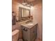 Bright bathroom featuring vanity with granite countertop, fixtures, and a toilet at 2333 Villa Ave, Indianapolis, IN 46203