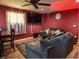 Cozy living room features plush seating, hardwood floors, and a ceiling fan at 2333 Villa Ave, Indianapolis, IN 46203