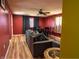 Cozy living room boasts wood floors and dining table with ample natural light at 2333 Villa Ave, Indianapolis, IN 46203