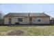 Spacious backyard with mature trees, patio, and privacy fence at 250 Three Notch Ln, Bargersville, IN 46106