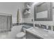 Bathroom featuring white subway tile, modern gray vanity, and new fixtures at 250 Three Notch Ln, Bargersville, IN 46106