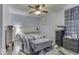 Bedroom with neutral walls, ceiling fan and decorative rug at 250 Three Notch Ln, Bargersville, IN 46106