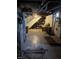 Spacious unfinished basement with concrete floor and block walls. Includes workshop area at 251 S 12Th Ave, Beech Grove, IN 46107