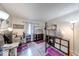 Bedroom with lofted bed, desk, and modern flooring. Room is bright and spacious at 2552 Spring Hill Ct, Indianapolis, IN 46268