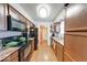 Well-lit kitchen boasts wood look floors, a double basin sink, and stainless steel appliances at 2552 Spring Hill Ct, Indianapolis, IN 46268