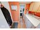 Laundry room includes washer and dryer connections, access to bathroom, and overhead cabinets at 2552 Spring Hill Ct, Indianapolis, IN 46268