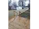Newly installed wood deck and wood fence enhance this backyard's appeal at 2626 E 18Th St, Indianapolis, IN 46218