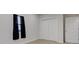 Cozy bedroom with a window and closet providing storage space at 2626 E 18Th St, Indianapolis, IN 46218