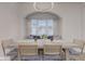 Bright dining nook featuring a built-in bench, a large table, and elegant lighting at 2626 E 18Th St, Indianapolis, IN 46218