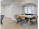 Bright dining area with a modern light fixture and a window bench seat at 2626 E 18Th St, Indianapolis, IN 46218