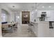 Open concept featuring a dining room with views of the kitchen and a built-in fireplace at 2626 E 18Th St, Indianapolis, IN 46218
