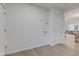 Hallway leading to other rooms and an open floor plan in a well lit home at 2626 E 18Th St, Indianapolis, IN 46218