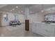 Open-concept living area featuring a modern kitchen and a comfortable seating area at 2626 E 18Th St, Indianapolis, IN 46218