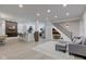 Open-concept living space featuring hardwood floors and plenty of natural light, ideal for modern living at 2626 E 18Th St, Indianapolis, IN 46218