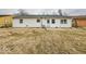 Back exterior of home with white siding and a patio area at 2714 Manlove Ave, Indianapolis, IN 46218